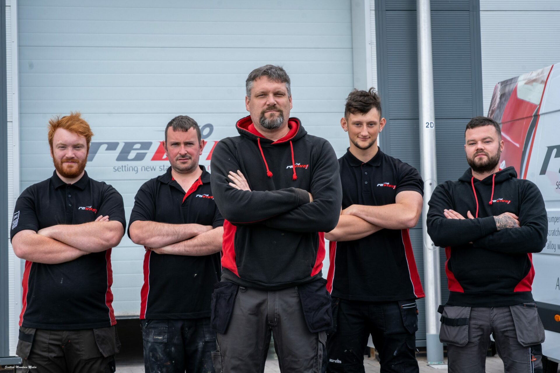 The Revive! Aberdeen team stand in front of Tom's repair centre