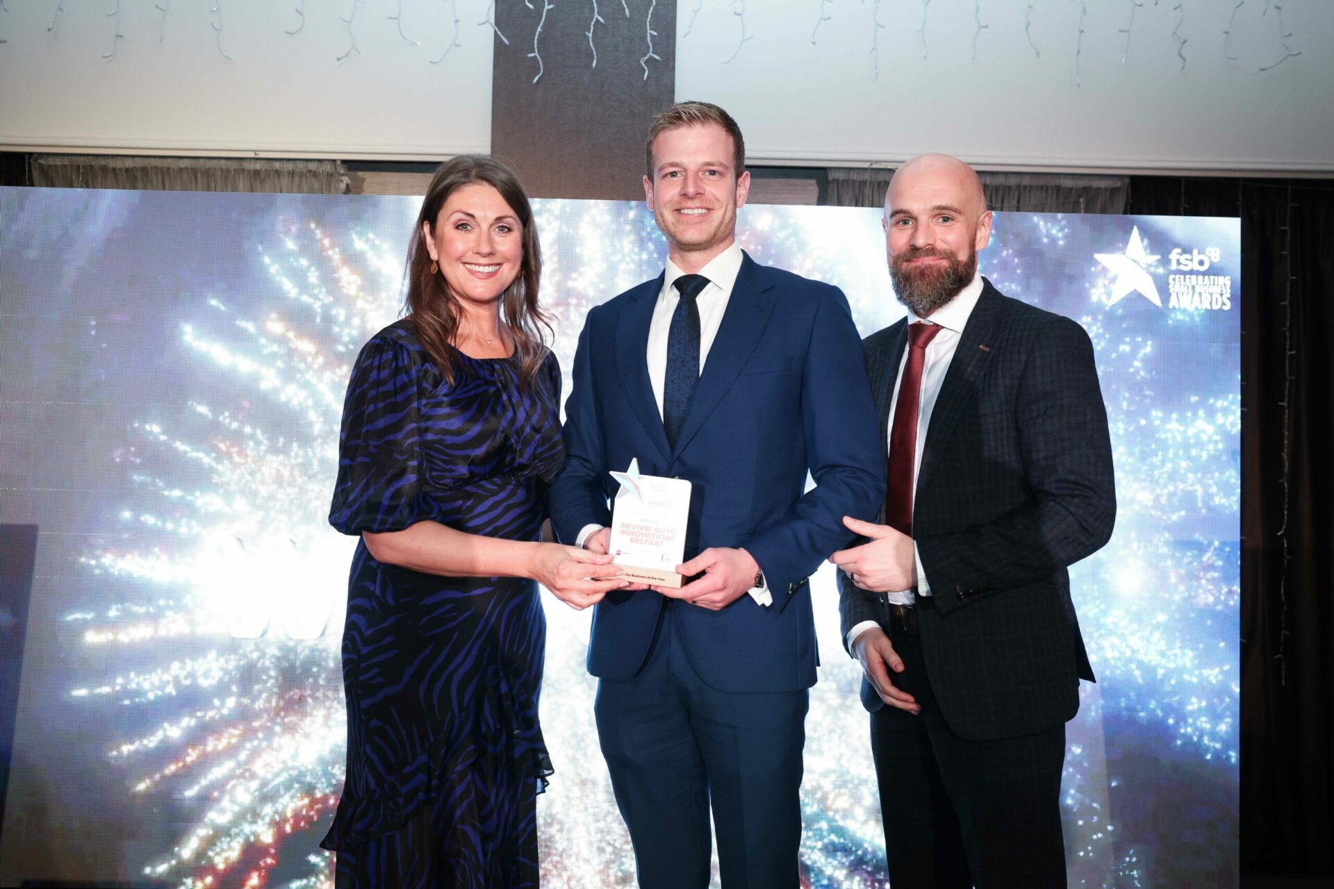 Revive! Northern Ireland owner, mark pronger, accepting the small business of the year award